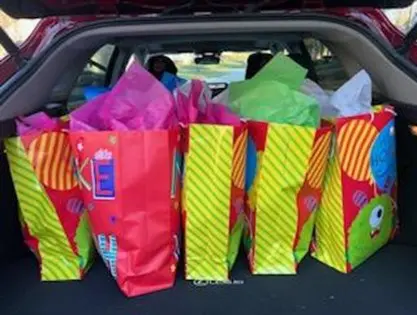 A car full of beautiful bags with gifts